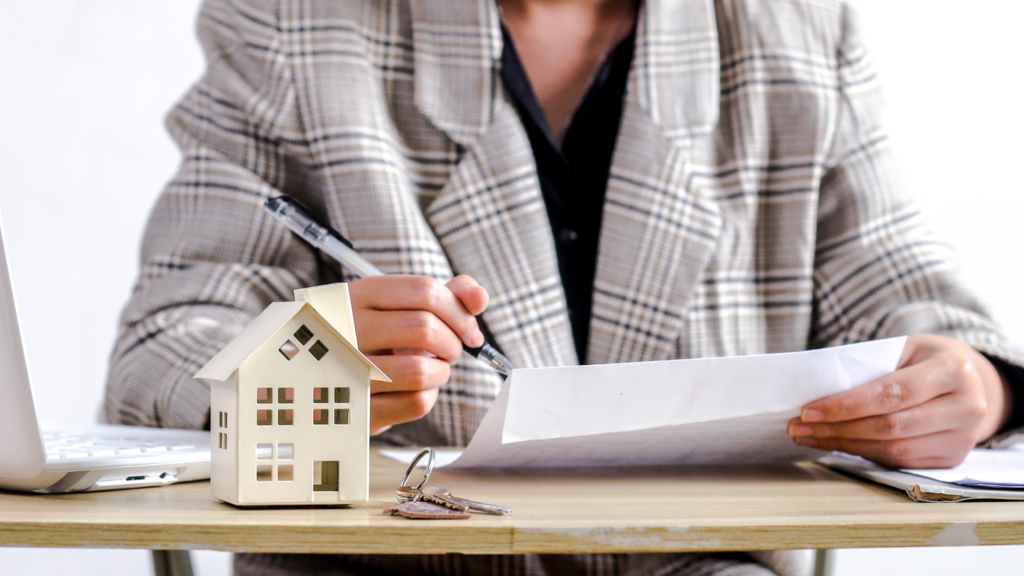 Tax professional reviewing property tax documents from his client