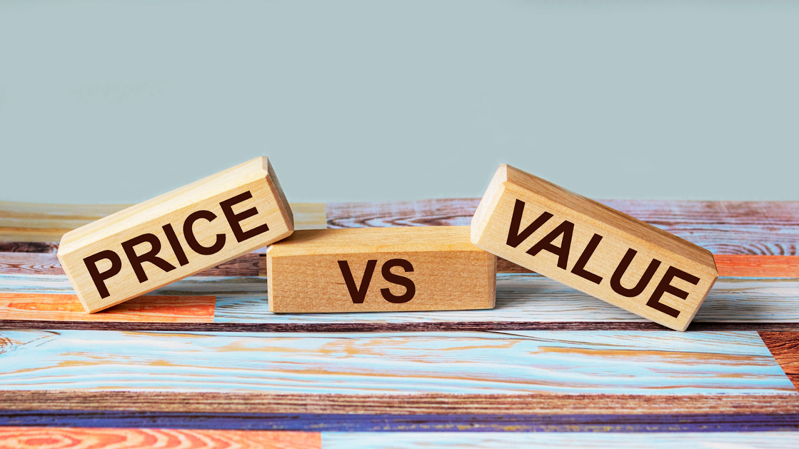 Price vs value on wooden blocks