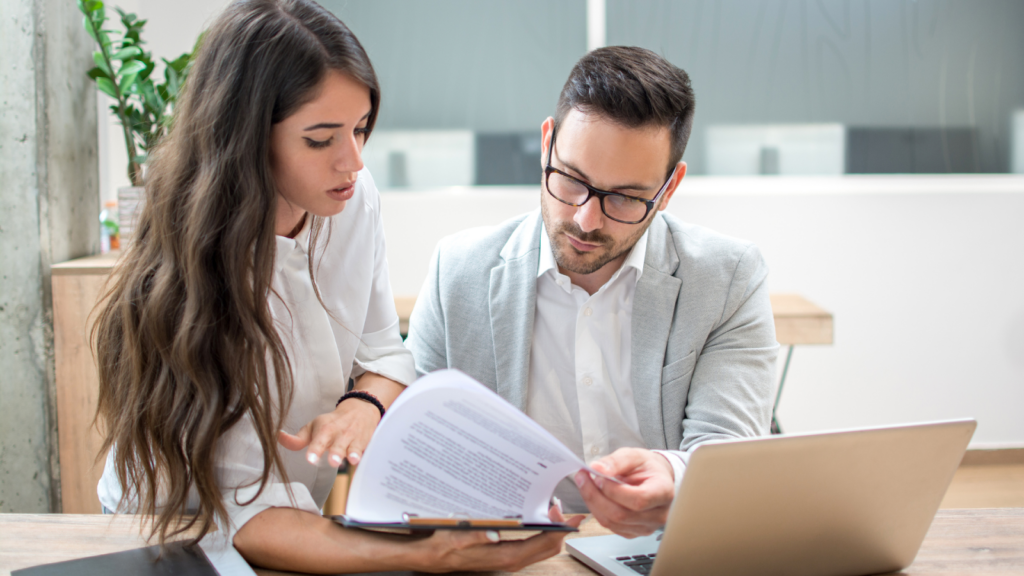 Tax adviser explaining the idea of challenging tax valuation to a client