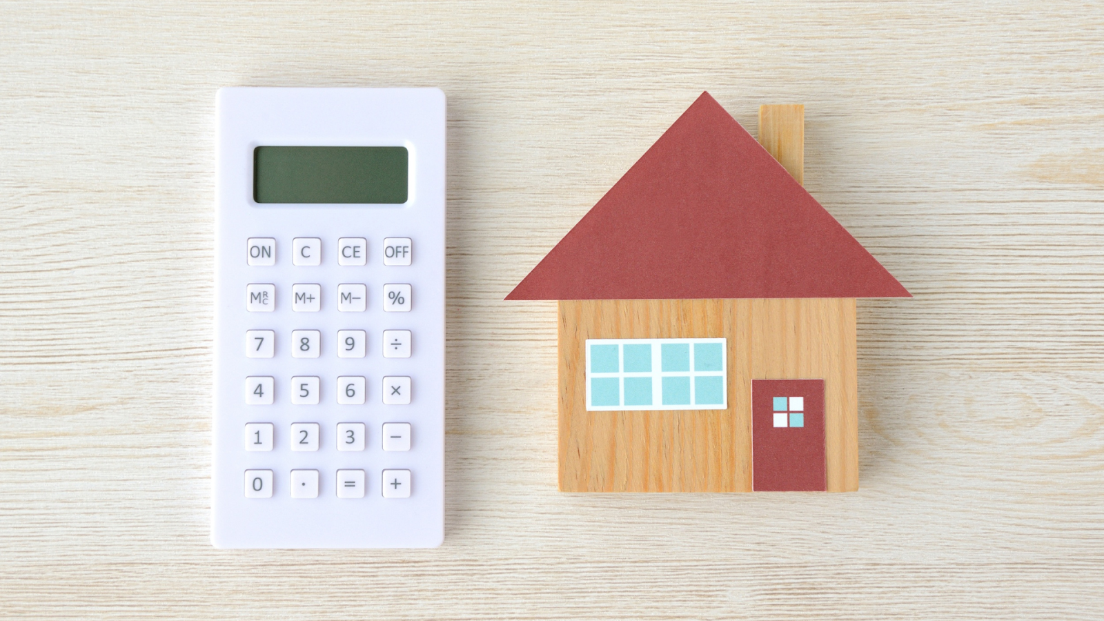 Representing property value with a calculator and model home