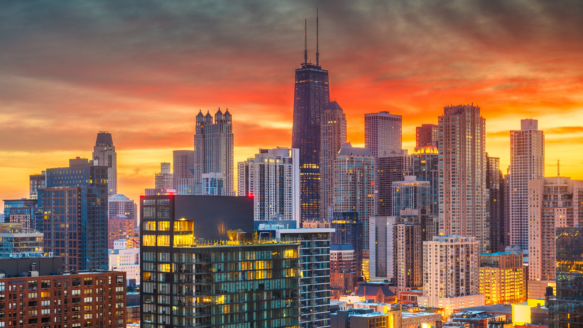 Chicago Illinois downtown skyline at dusk overlooking dense urban residential and commercial properties