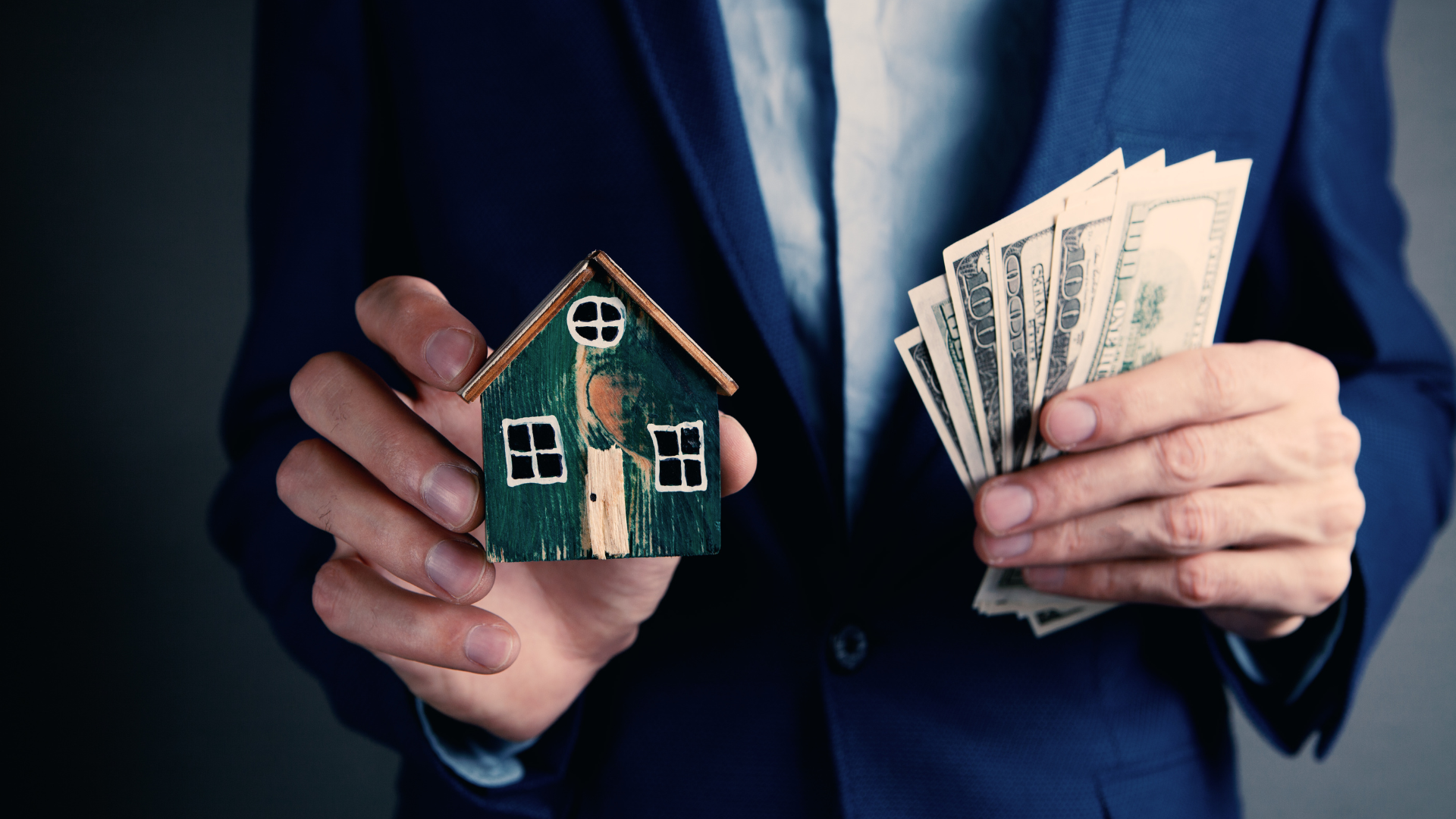 Person holding miniature home and money for extra mortgage payments