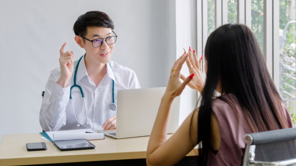 Physician meeting with resident at a community health clinic Illinois