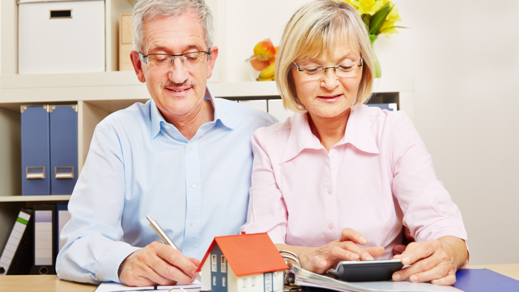 Elderly homeowners reviewing Cook County property tax exemption documents