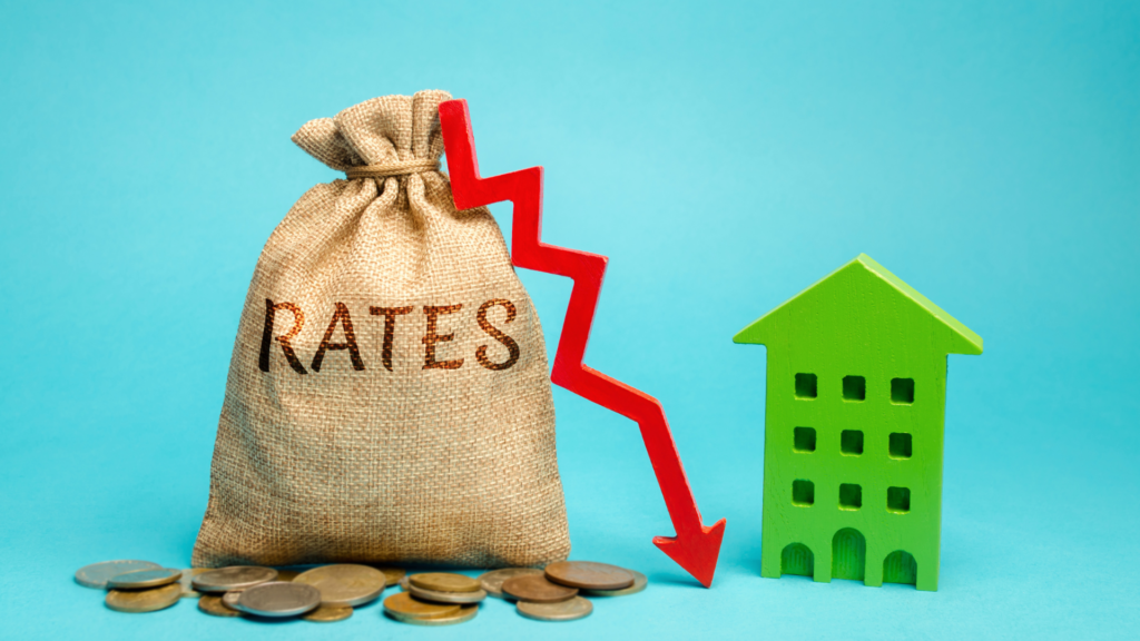 A falling rates bag beside a home illustrating misleading low tax rates