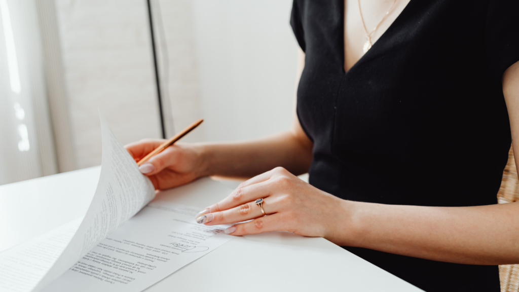 Person carefully going through contents of a formal tax appeal letter