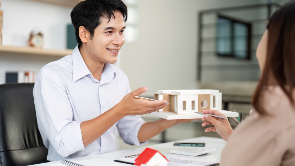 Professional explaining the difference between real estate and property taxes