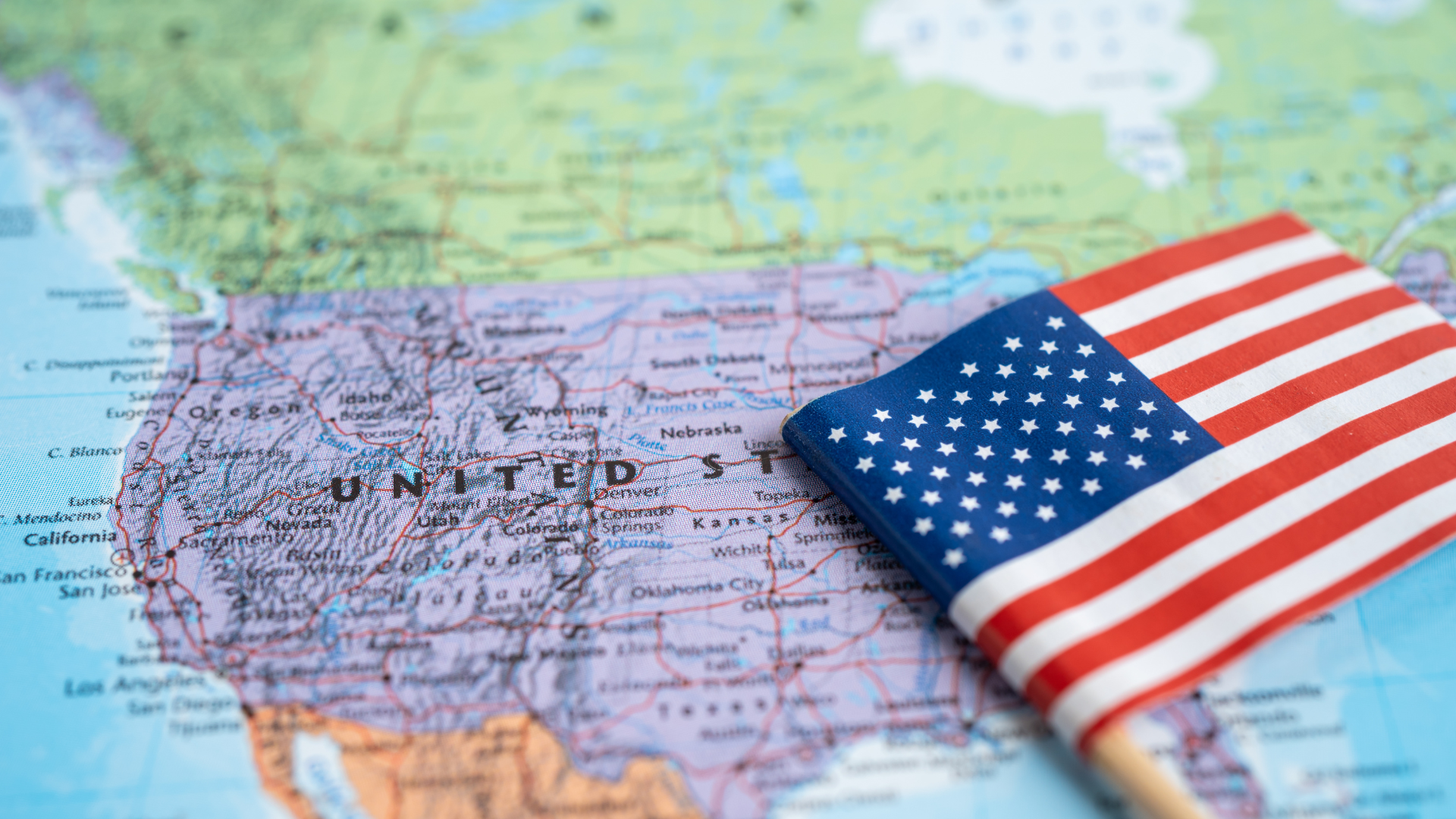 United States map and flag illustrating property tax differences across states
